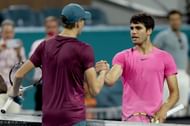Jannik Sinner (L) and Carlos Alcaraz